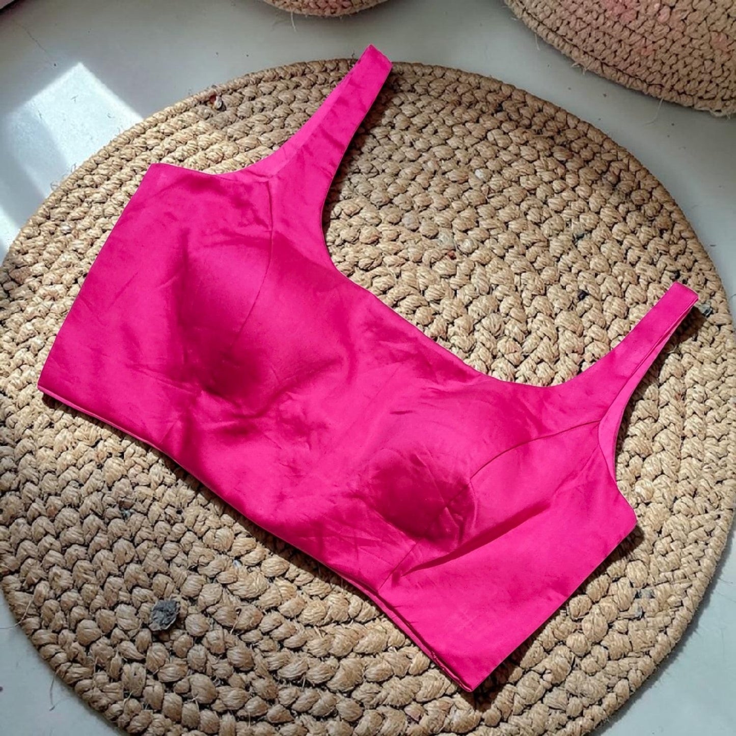 Manishaa's Boutique sleeveless pink ready-made saree blouse with padded cups and a square neckline.